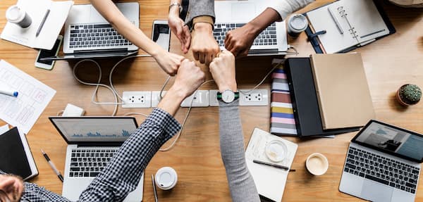 colleagues-giving-fist-bump